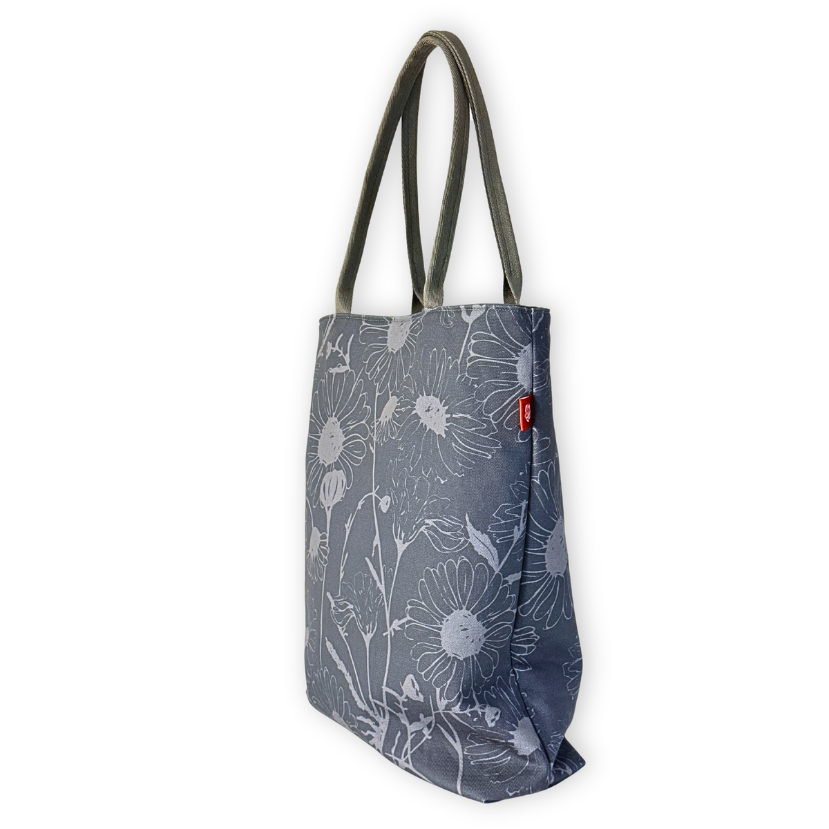 Gaia Shoulder Carry Tote in Wild Daisy, Harbor Mist, sitting upright side view
