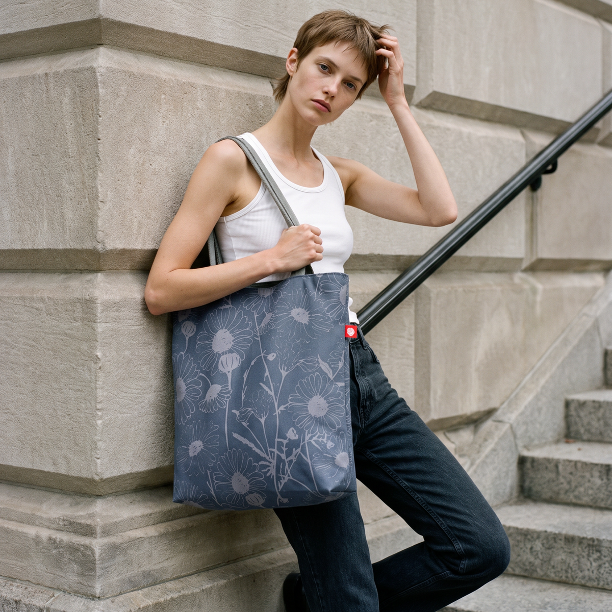 Gaia Shoulder Carry Tote in Wild Daisy, Harbor Mist, model carrying tote