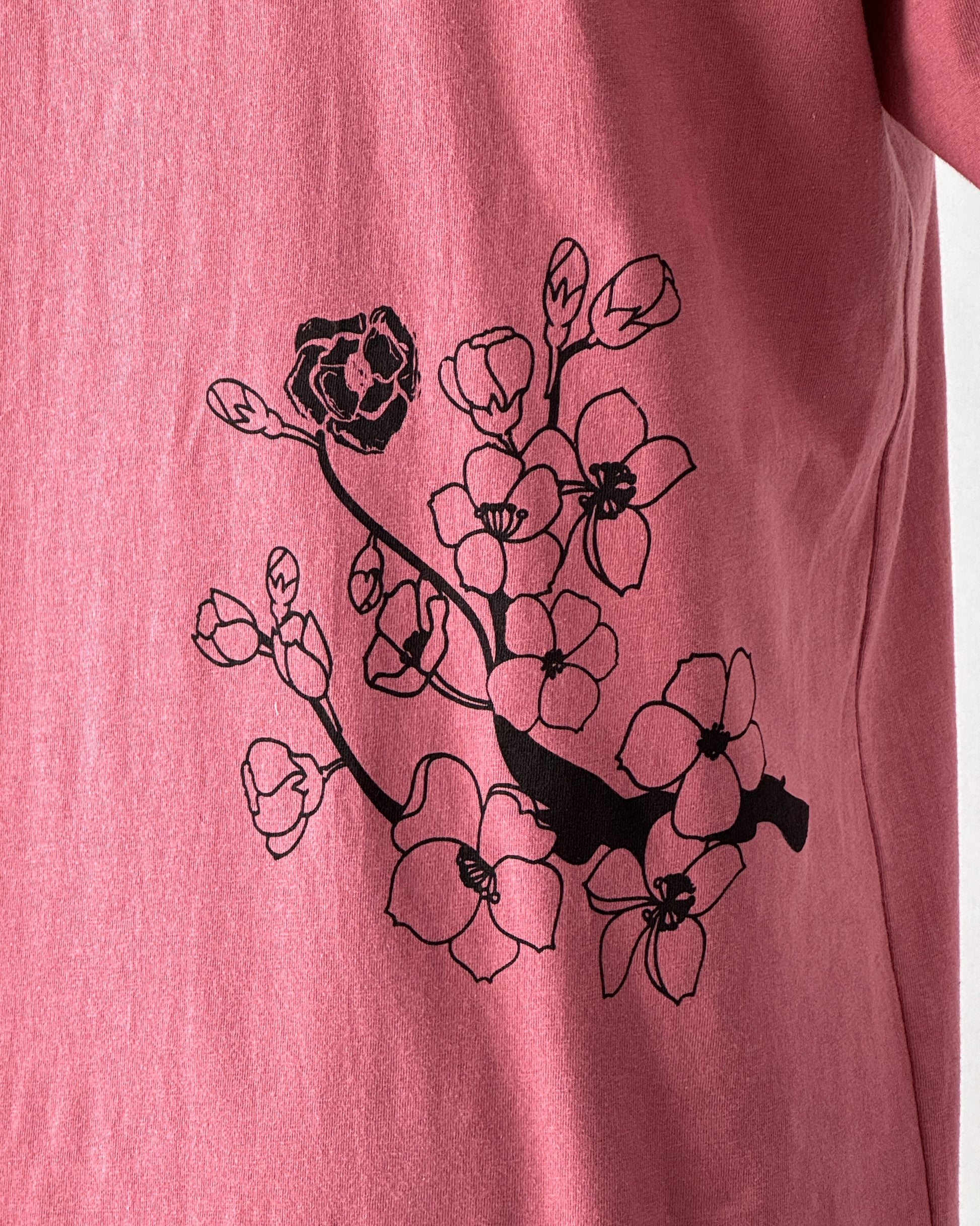 "Cherry blossoms short sleeve t-shirt with a delicate floral design, perfect for casual wear."
"Lightweight and breathable short sleeve tee featuring cherry blossoms print on organic cotton."
"Nature-inspired cherry blossoms tee, ideal for everyday comfort and style."
"Floral short sleeve t-shirt with cherry blossoms design for a casual, elegant look."
"Soft organic cotton t-shirt with a cherry blossoms motif, blending comfort and nature-inspired style."